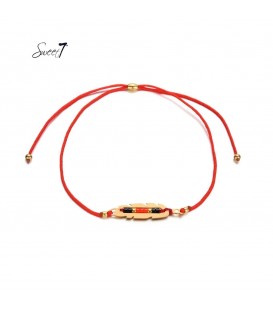 rode elastische armband met goudkleurige detail met kleine kraaltjes