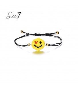 armbandje van zwart koord met een smiley gezicht