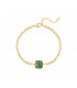 Goudkleurige schakel armband met een groene steen