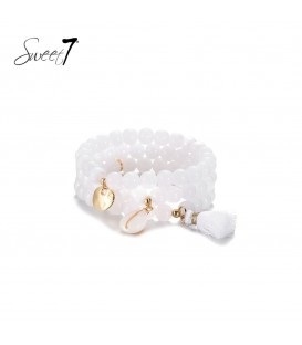 Witte kralen armband met meerdere strengen