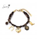 Bruine armband met dieren print een hart en gelukssymbolen