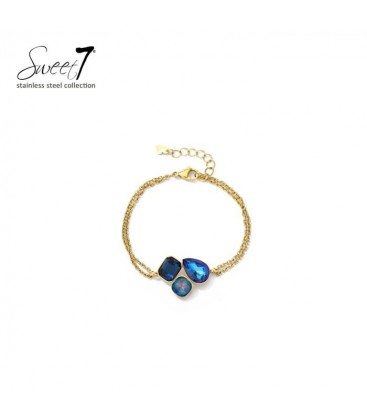 Armband met blauwe kristallen en goudkleurige schakel