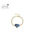 Armband met blauwe kristallen en goudkleurige schakel